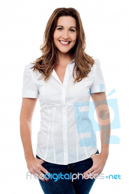 Smiling Woman Posing In Style, Isolated Over White Stock Photo