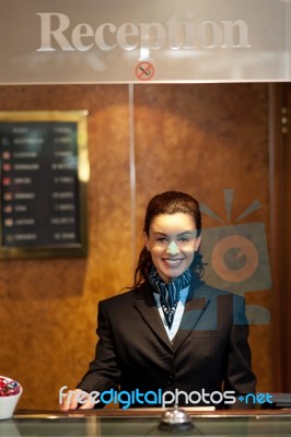 Smiling Woman Receptionist Stock Photo