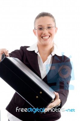 Smiling Woman Showing Briefcase Stock Photo