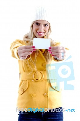 Smiling Woman Showing Business Card Stock Photo