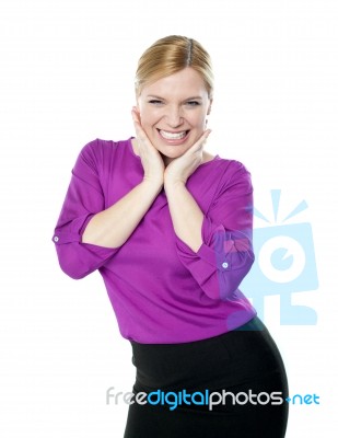 Smiling Woman Standing On White Stock Photo