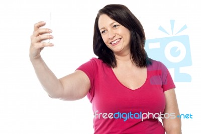 Smiling Woman Taking A Selfie Stock Photo