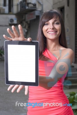 Smiling Woman Using Digital Tablet Stock Photo