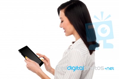 Smiling Woman Using Tablet Pc Stock Photo