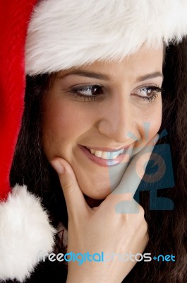 Smiling Woman Wearing Christmas Hat Stock Photo