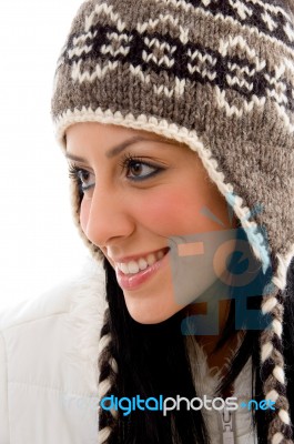 Smiling Woman Wearing Woolen Cap Stock Photo