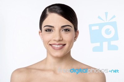 Smiling Woman With Bare Shoulders Stock Photo