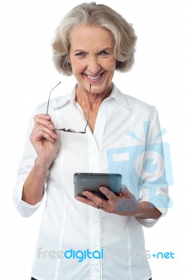 Smiling Woman With Tablet Over White Stock Photo