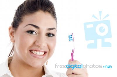 Smiling Woman With Toothbrush Stock Photo