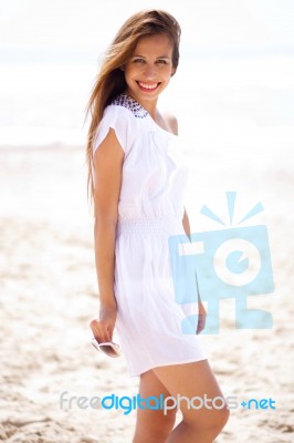 Smiling Women On The Beach Stock Photo