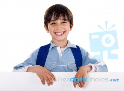 Smiling Young Boy Behind The Blank Board Stock Photo