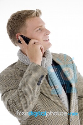 Smiling Young Caucasian Interacting On Mobile Stock Photo