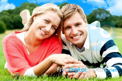 Smiling Young Couple In Outdoor Stock Photo