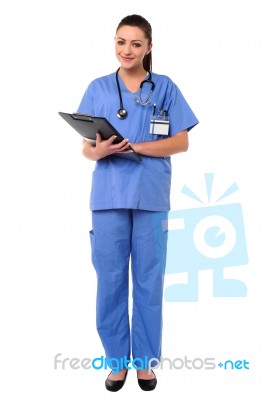 Smiling Young Female Doctor At Duty Stock Photo