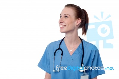 Smiling Young Female Doctor Posing Stock Photo