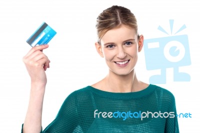 Smiling Young Girl Showing Her Cash Card Stock Photo