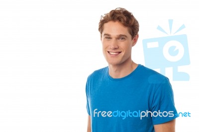 Smiling Young Guy In Casual Attire Stock Photo