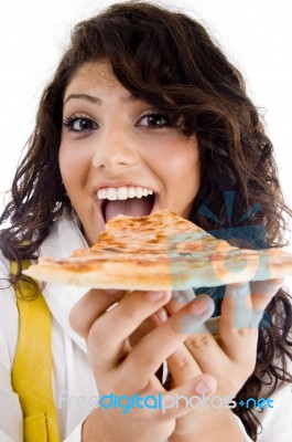 Smiling Young Lady Eating Pizza Stock Photo