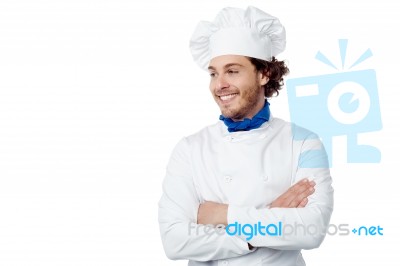 Smiling Young Male Chef Posing Confidently Stock Photo