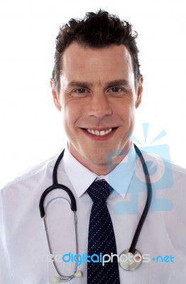 Smiling Young Male Doctor Stock Photo