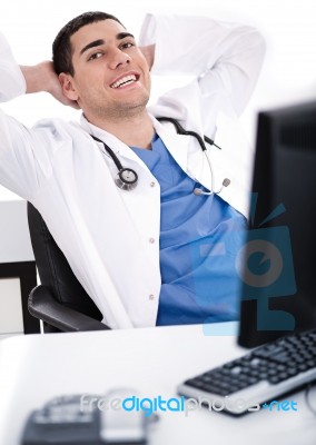 Smiling Young Male Doctor Stock Photo