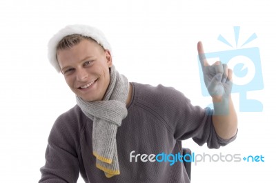 Smiling Young Male Pointing Up Stock Photo