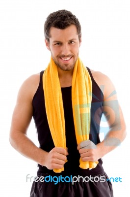 Smiling Young Man Holding Towel Stock Photo