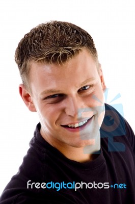 Smiling Young Man looking up Stock Photo