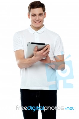 Smiling Young Man Using Tablet Pc Stock Photo