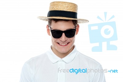 Smiling Young Man Wearing Hat Stock Photo