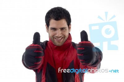 Smiling Young Man With Thumb Up Stock Photo