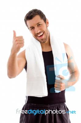 Smiling Young Man With Thumbs Up Stock Photo