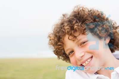 Smiling Young Pretty Boy Posing Stock Photo