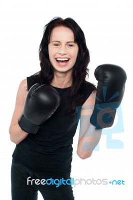 Smiling Young Slim Female Boxer Stock Photo