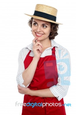 Smiling Young Thoughtful Baker Stock Photo