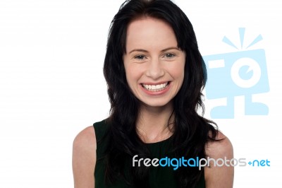 Smiling Young Woman On White Background Stock Photo