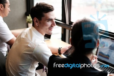 Smilling Office Worker And Dashboard Report Stock Photo