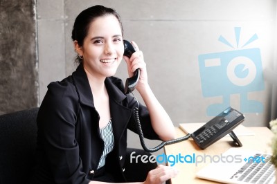 Smilling Young Businesswoman On Phone Stock Photo