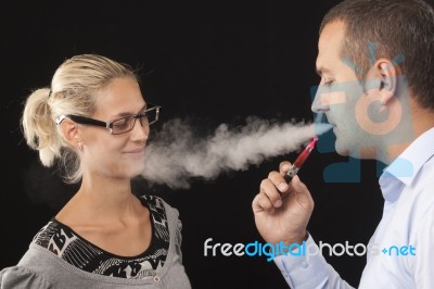 Smoke In The Face Stock Photo