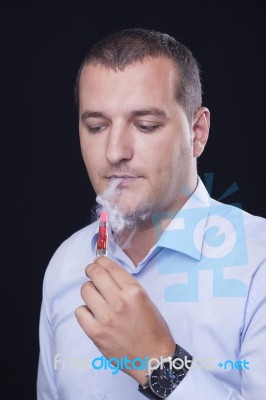 Smoking Electric Cigarettes Stock Photo