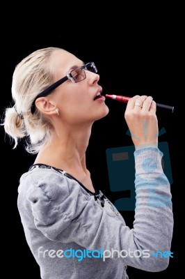 Smoking Electric Cigarettes On The Black Background Stock Photo