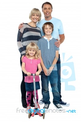 Snap Shot Of A Complete Family. Full Length Stock Photo