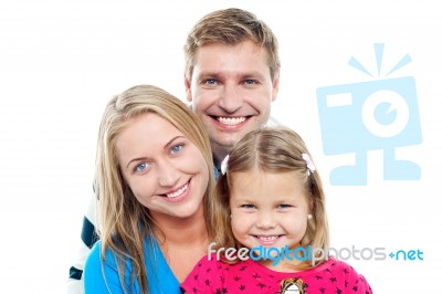 Snap Shot Of An Adorable Charming Family Stock Photo