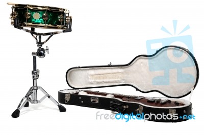 Snare Drum And Guitar In Case  Stock Photo