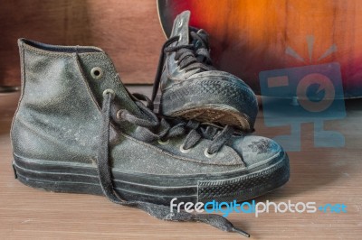 Sneakers On A Wooden Stock Photo