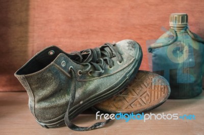 Sneakers On The Wooden Stock Photo