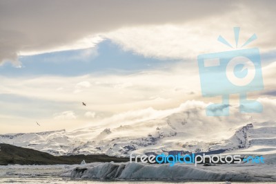 Snow Mountain Udder The Sky In Iceland Stock Photo