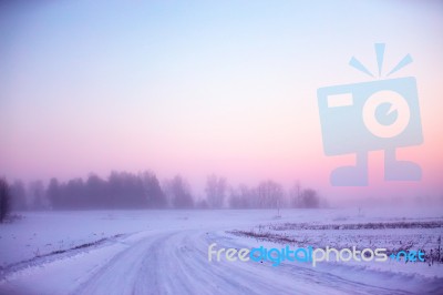 Snowy Winter Road. Winter Foggy Morning Stock Photo