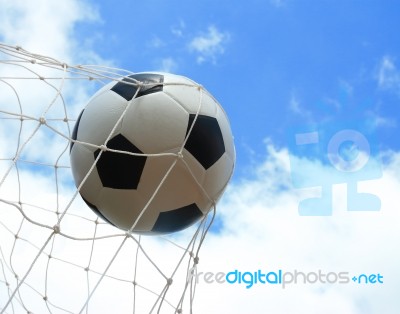 Soccer Ball In Goal Stock Photo