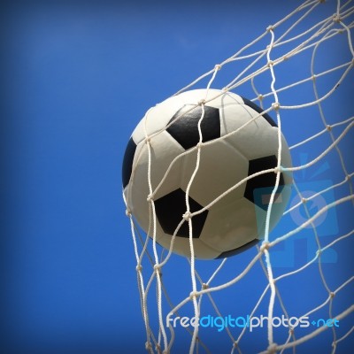 Soccer Ball In Net Stock Photo